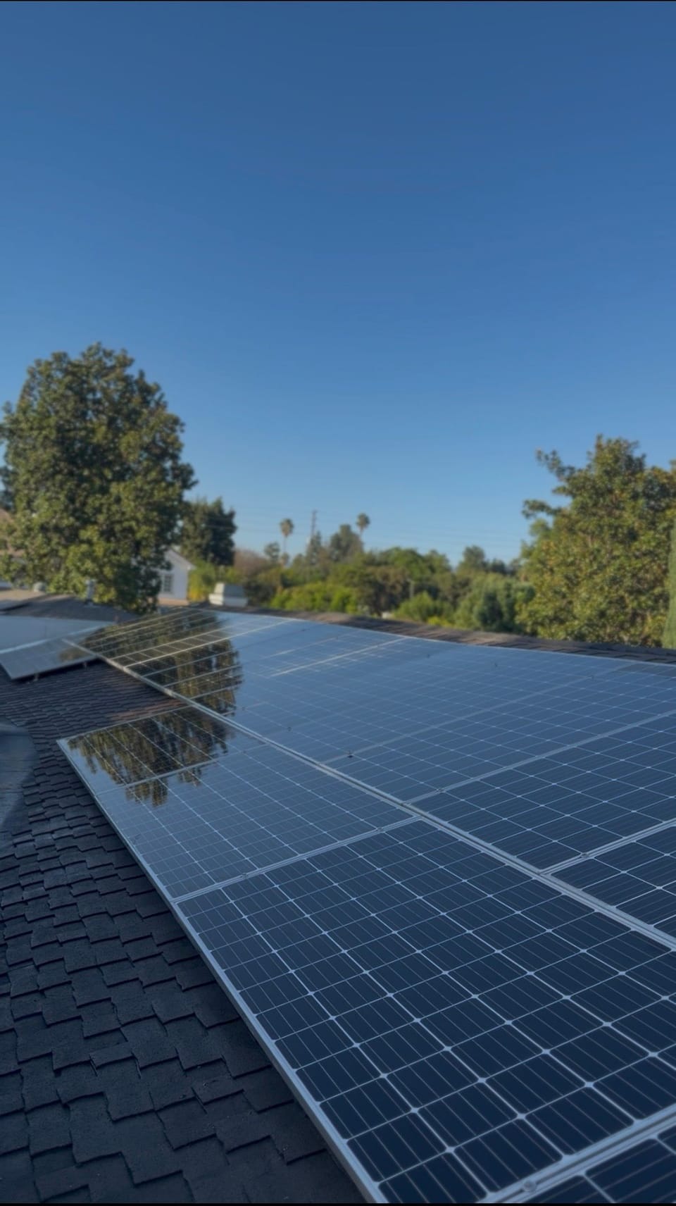 Clean residential solar panels on a tile roof in Los Angeles after a Salazar Cleaning Services visit